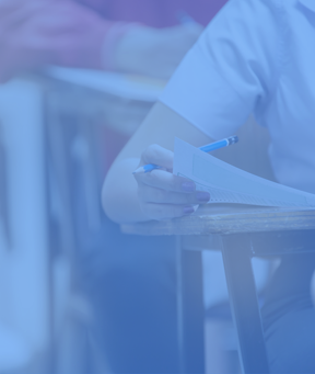 A student filling out documents at the bilingual school in Paris
