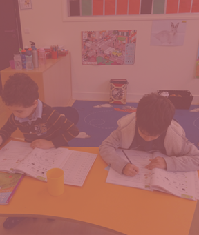 BISP students working at their desks